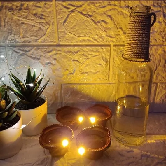 asmafashion Water Sensor Led Diyas Candle with Water Sensing Technology E-Diya, Warm Orange Ambient Lights, Battery Operated Led Candles for Home Decor, Festivals Decoration (Pack of 12)