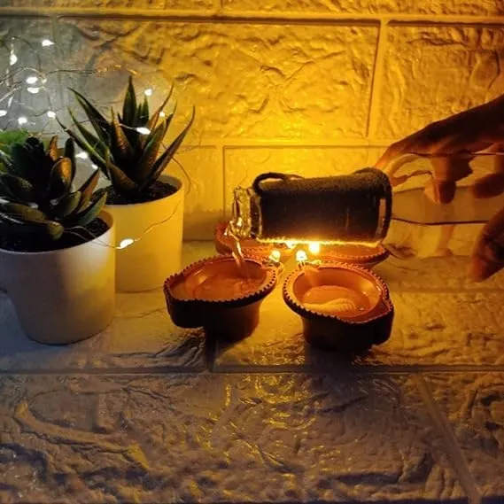 asmafashion Water Sensor Led Diyas Candle with Water Sensing Technology E-Diya, Warm Orange Ambient Lights, Battery Operated Led Candles for Home Decor, Festivals Decoration (Pack of 12)