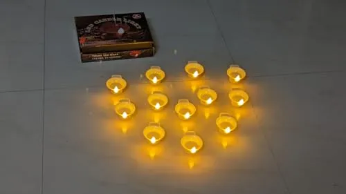 Dwarakesh Enterprises® Pack of 12 Battery Powered high brigh 7.5 cm Size Reflective Wax White Colored flameless Ambient Romantic Yellow e-Led Tea Light Candles with Big Transparent flammen Wick